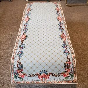 Soft floral carpet runner, light blue with floral edge pattern, good condition